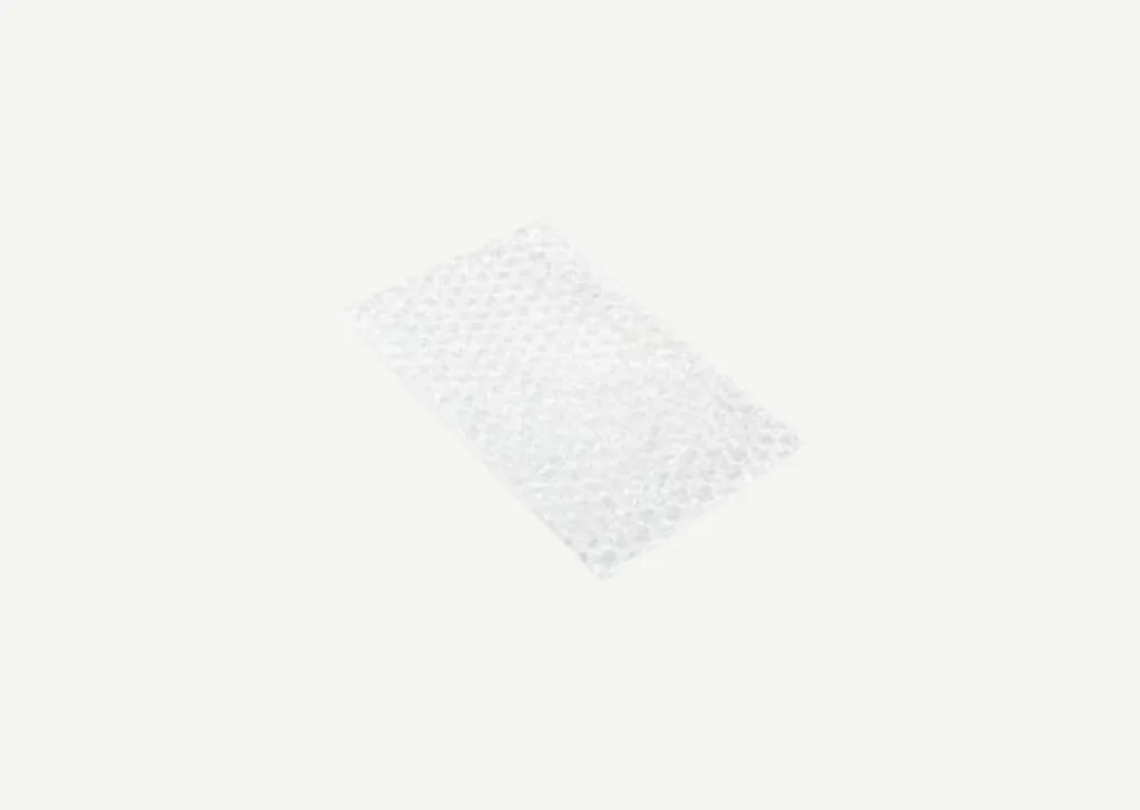 Transparent bubble wrap bags on a gray background
