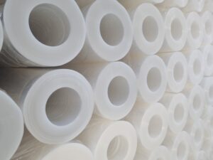 Coreless transparent stretch film rolls – stacked one on top of the other.
