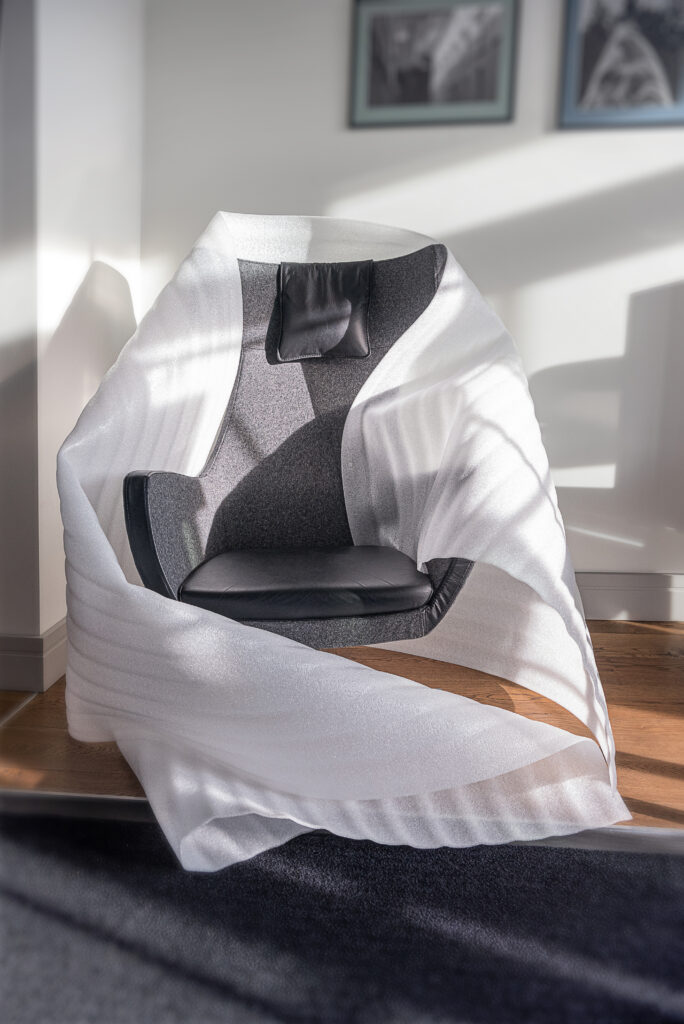 pe-foam-protection-armchair Armchair wrapped in white polyethylene foam for protective packaging during transport or storage