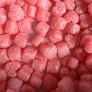 Pink heart-shaped biodegradable packing peanuts for eco-friendly packaging