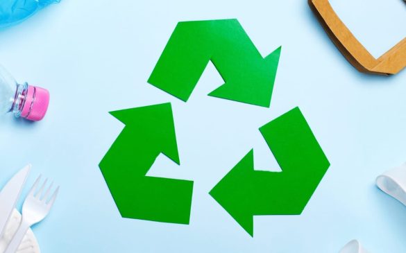 Proper sorting and recycling of packaging waste – cardboard, plastic, metal, and mixed waste bins.